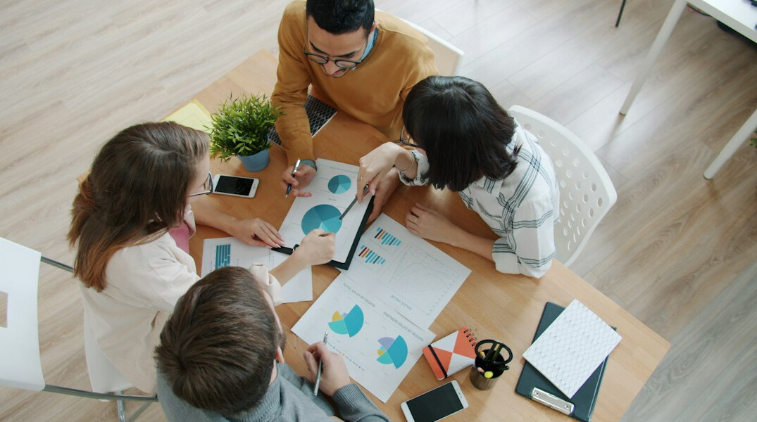 business people negotiating at table
