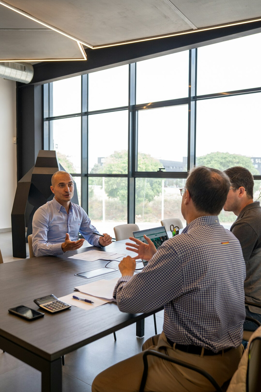 business people negotiating in meeting room