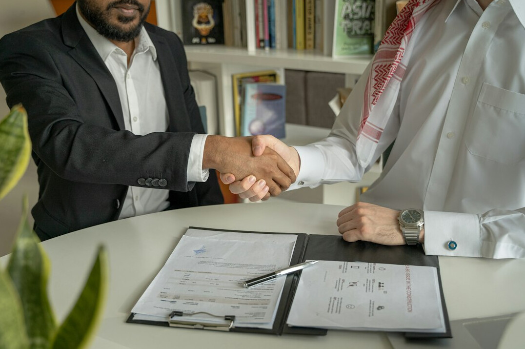 man negotiating contract